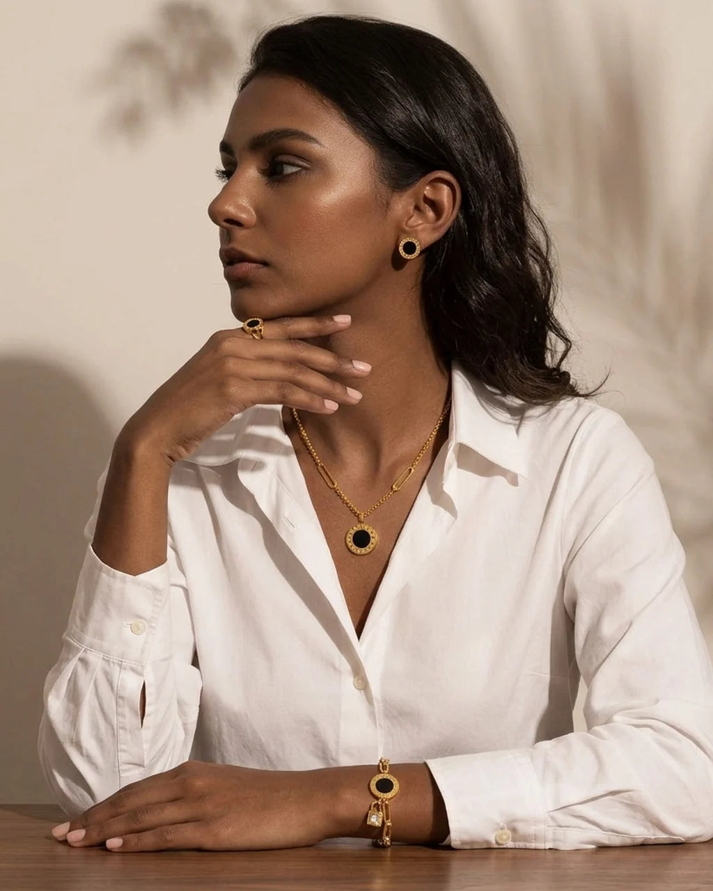 The Monochrome Edit, worn: the black disc studs, ring, necklace and bracelet