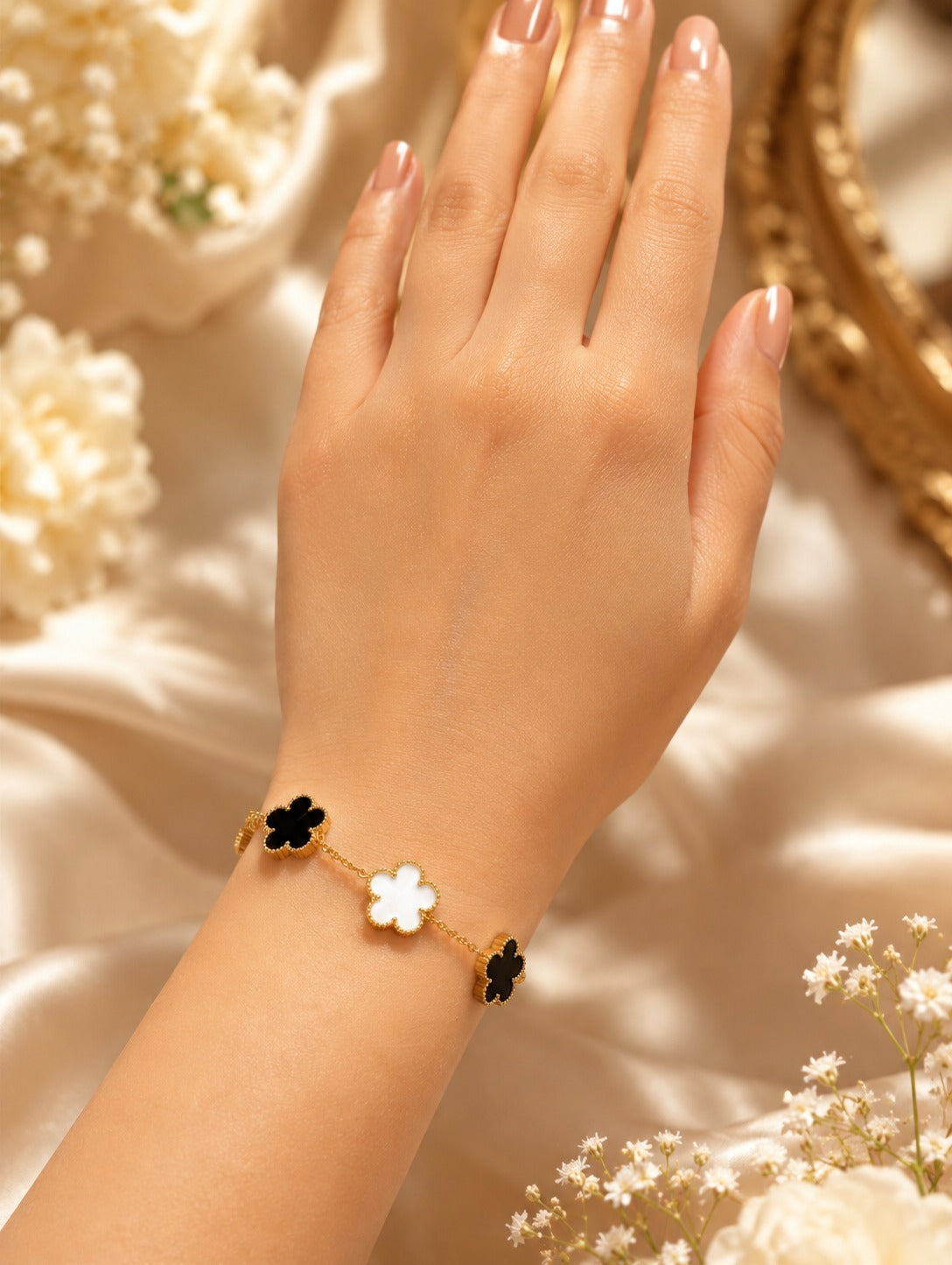 Black & White Flower Station Bracelet, worn on the wrist