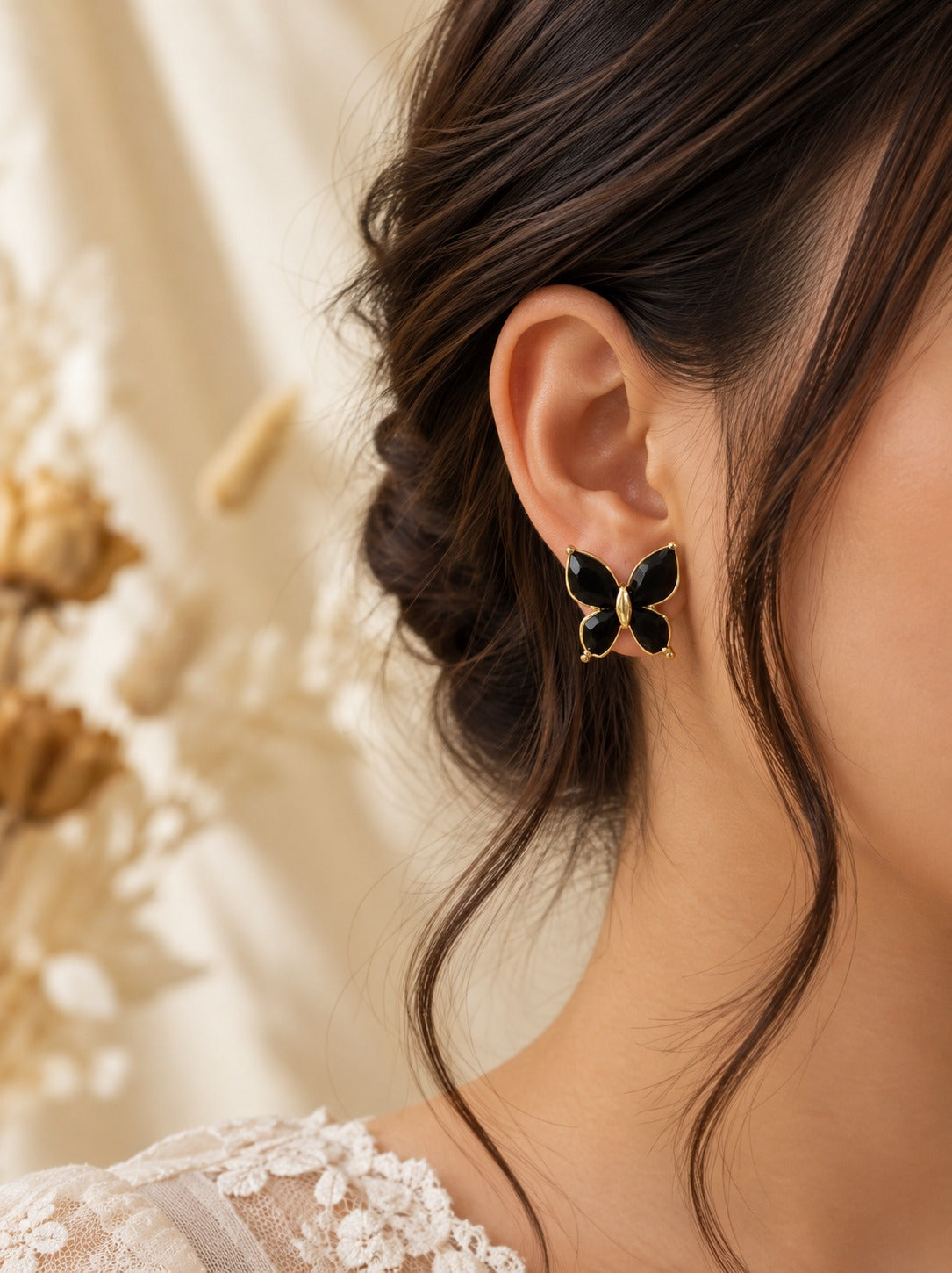 Black Butterfly Studs, worn on the ear