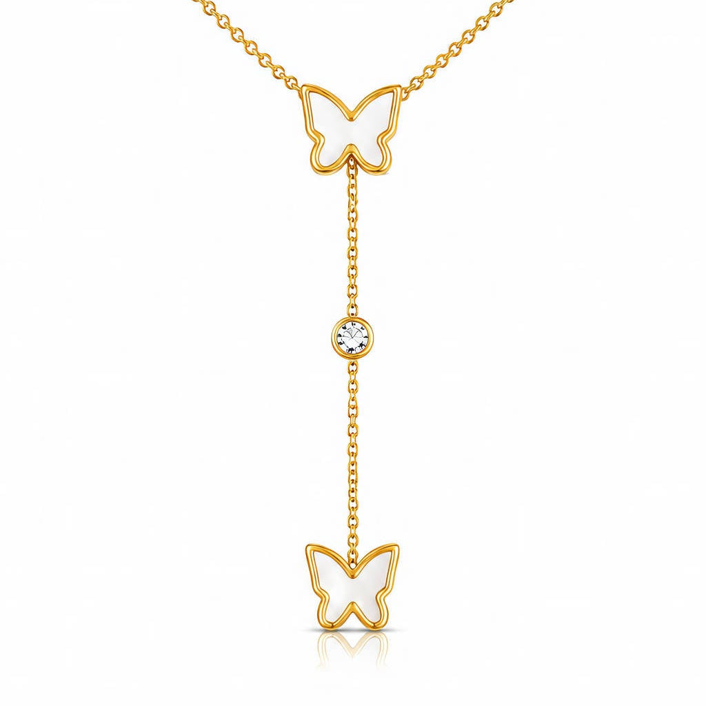 Butterfly Lariat Necklace: Y-shaped gold-tone chain with two white butterfly charms, close-up on white