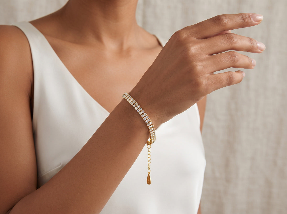 Gold-Tone Tennis Bracelet, worn on the wrist