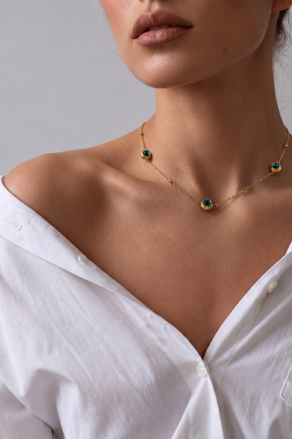 Evil Eye Station Necklace, worn at the neckline