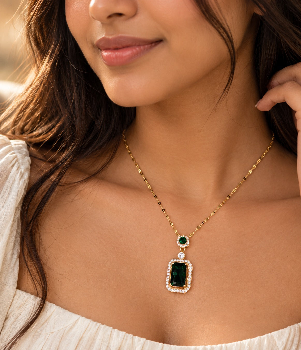 Green Crystal Halo Pendant Necklace, worn at the neckline