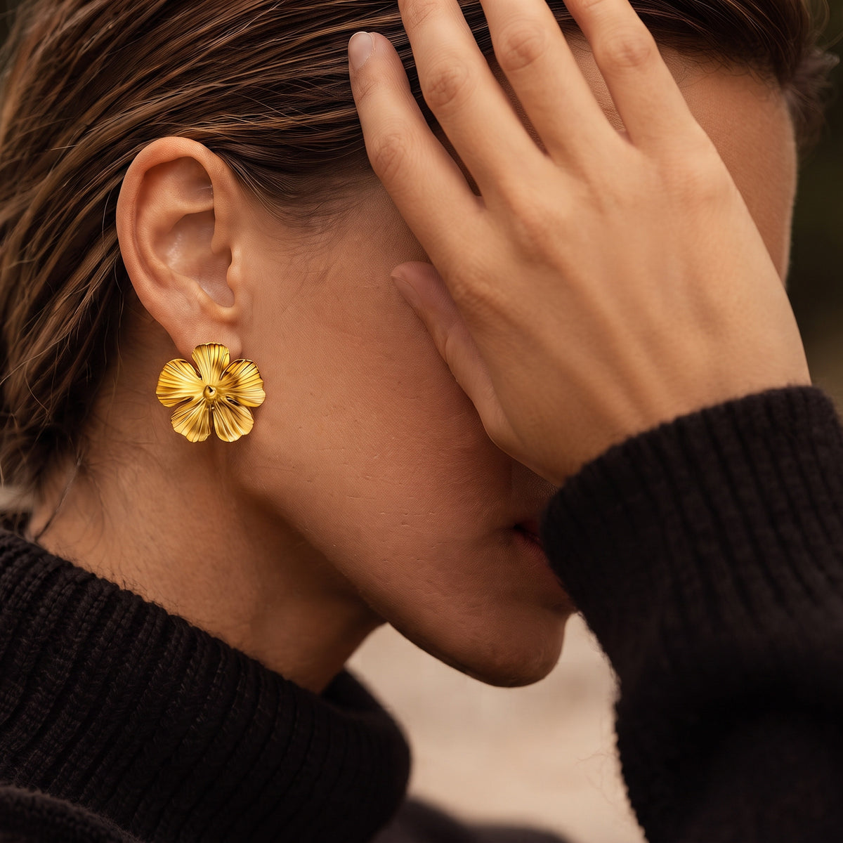 Gold-Tone Flower Studs, worn